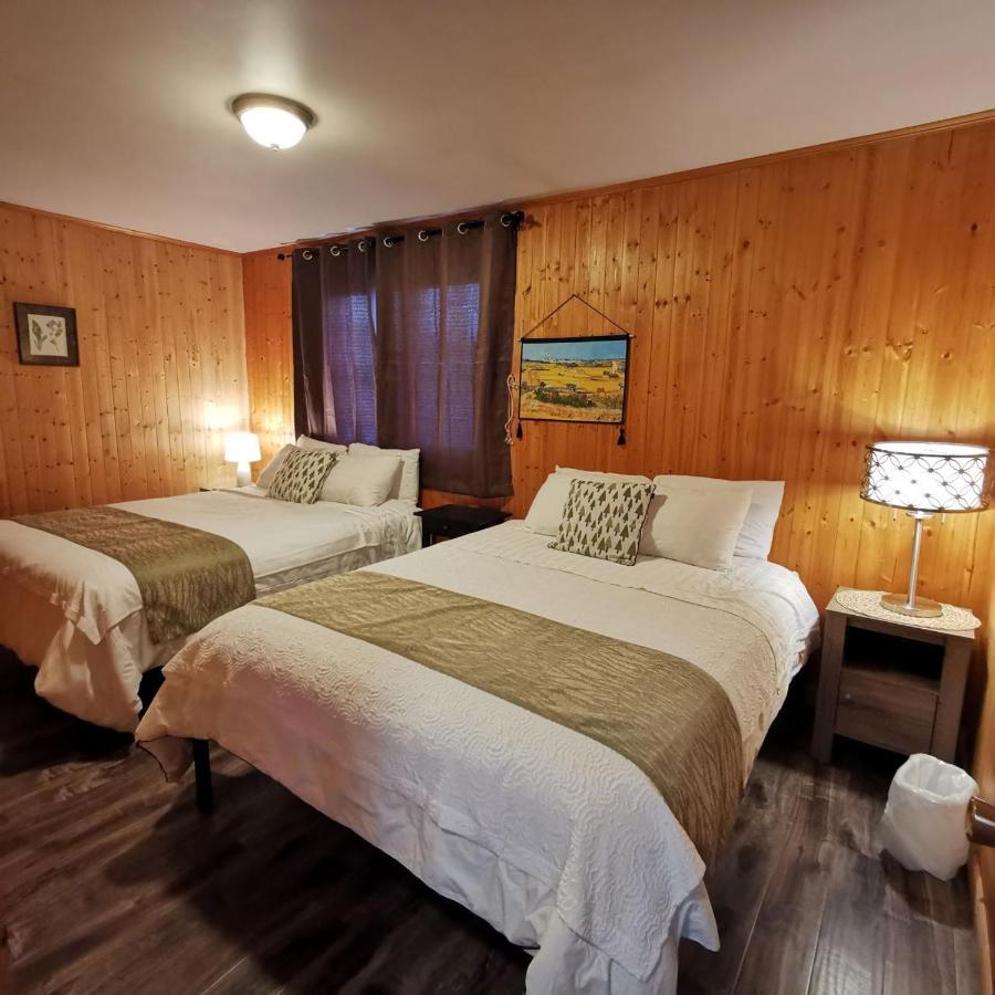 Knotty Pine Cottages, & *