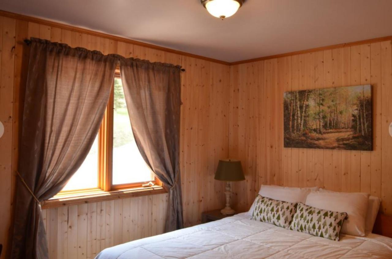 Knotty Pine Cottages, & *