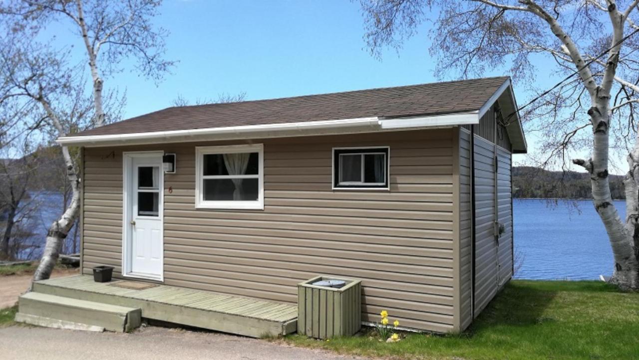 Knotty Pine Cottages, & *